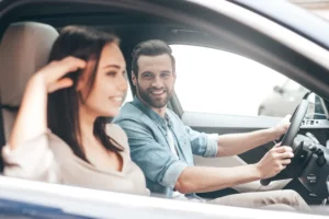 couple driving a car