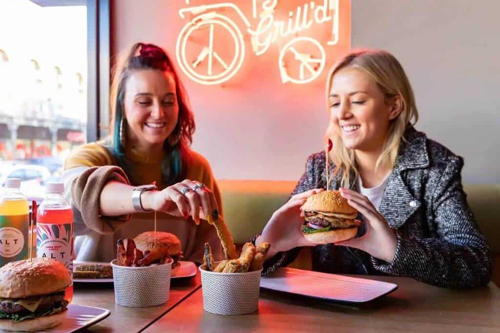 Students Eating Burgers at Grill'd